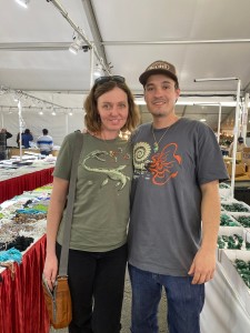 John and Alisha wearing Ammonite T-Shirts