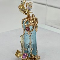 AGTA award tourmaline pendant with octopus and pirate's treasure.