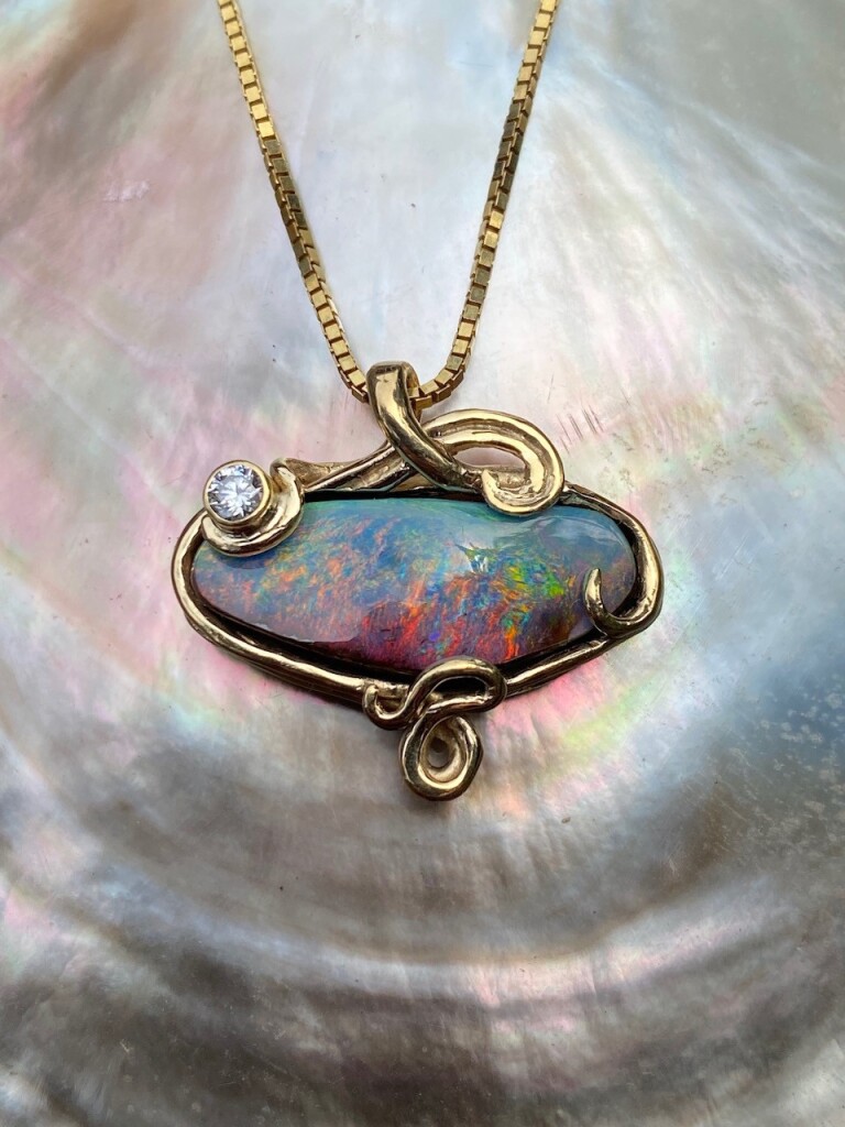 18K gold Bermuda Bliss wave pendant with Australian Boulder Opal and 15 point diamond